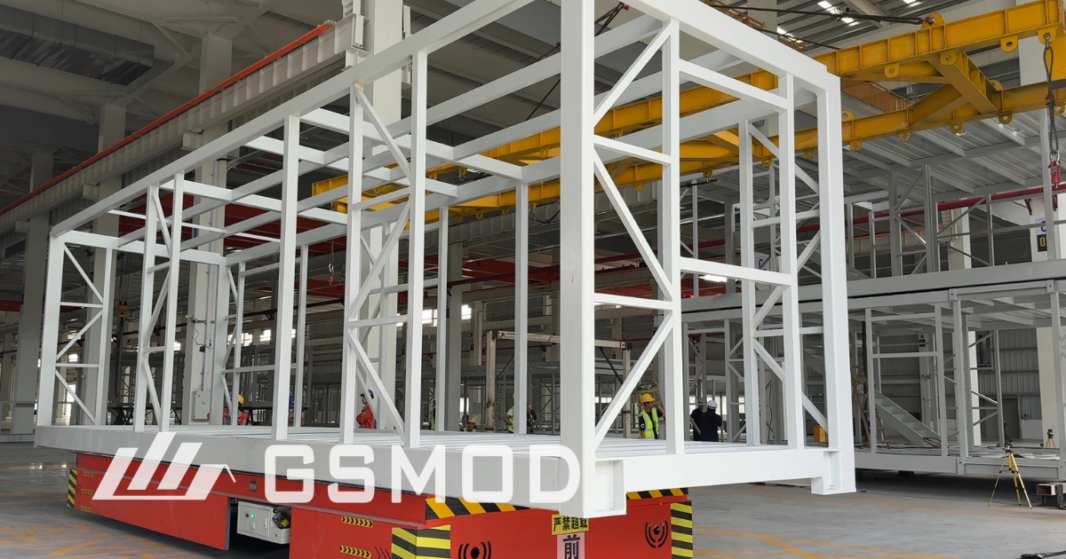 A building module frame being transported.