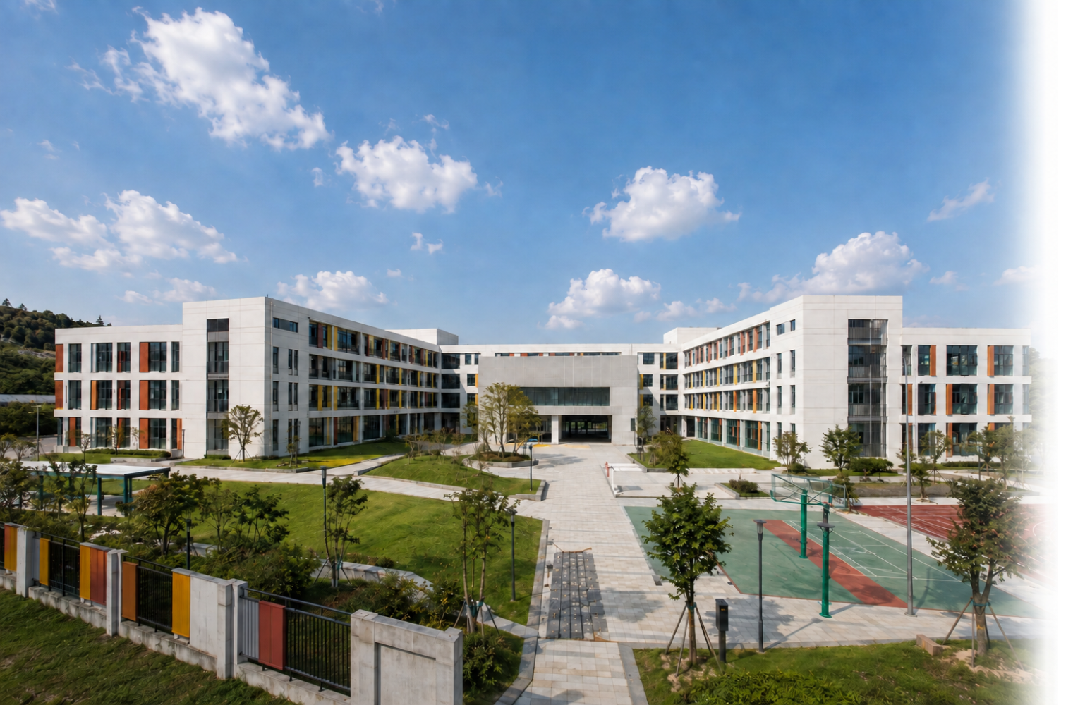 Modern modular school campus with teaching buildings, courtyard and sports facilities