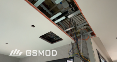 Building services and electrical rough-in during factory fit-out of a volumetric module